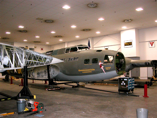 The Memphis Belle B-17 Flying Fortress stands disassembled in its hangar across from Naval Support Activity Mid-South during a 2003 restoration. U.S. Navy photo by Susan Hyback, courtesy Wikimedia Commons.