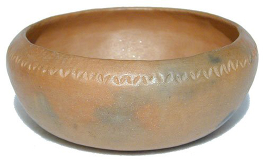 A 10-inch-diameter micaceous pottery bowl made by Virginia T. Romero. Image courtesy LiveAuctioneers.com Archive and Allard Auctions Inc.