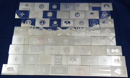 State silver bars. Image courtesy Blue Moon Coins Inc.