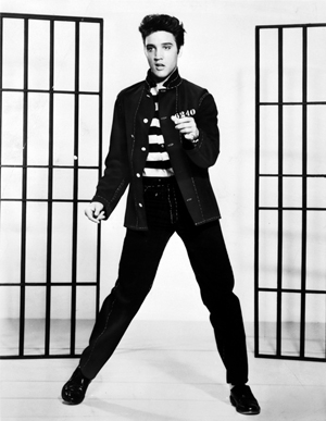 1957 publicity photo of Elvis Presley in the lead role of the film Jailhouse Rock. Library of Congress image.