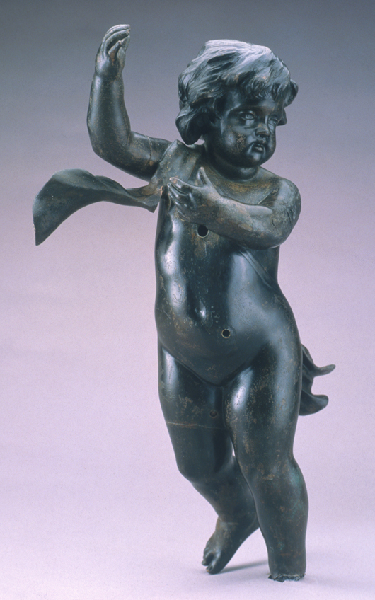 While this bronze cherub from the Titanic probably adorned a staircase newel, its smaller size suggests it was not part of the ship's famous Grand Staircase. Image courtesy RMS Titanic, Inc., a subsidiary of Premier Exhibitions, Inc.