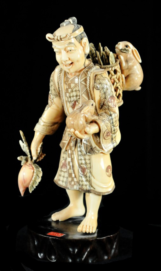 Japanese carved ivory figure with rabbits, 20th century. Estimate: $1,000-$1,500. Image courtesy Gray’s Auctioneers.