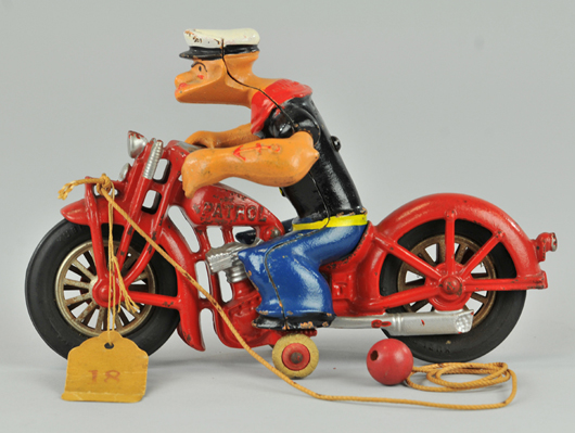 Hubley cast-iron Popeye on motorcycle. Estimate $10,000-$12,000. Bertoia Auctions image.   