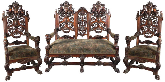 Phenomenal 19th century Italian carved walnut three-piece parlor suite (settee and armchairs). Image courtesy Crescent City Auction Gallery.