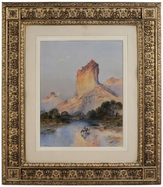 By far the sale’s top lot and a new record for Thomas Moran was his watercolor on paper, ‘Cliffs of Green River - Wyoming Territory, view of Castle Butte.’ The 28-x-21 1/4-inch painting is in its original late 19th century gilt wood and composition cassetta-style frame is inscribed verso in ink ‘T. Moran.’ It sold for a record $1.77 million (est. $250,000/$350,000). Image courtesy Brunk Auctions.