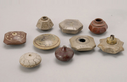 Group of nine opium bowls. Estimate: $700-$900. Image courtesy Michaan's Auctions.