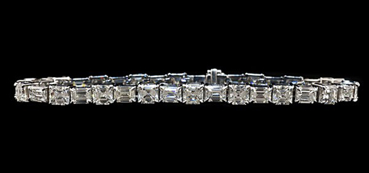 Asscher and emerald cut diamond tennis bracelet, 18-carat white gold and diamond bracelet of 18 Asscher-cut diamonds, 10.04 carats and 18 emerald-cut diamonds, approximately 7.42 carats, 7 inches. Estimate: $45,000-$65,000. Image courtesy Cowan’s Auctions Inc.   