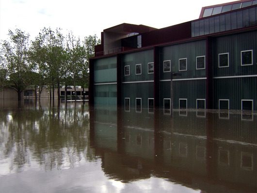  The University of Iowa's Art Building West (foreground) and Art Building (background) during the Iowa Flood of 2008. Image by Craig Dietrich. This file is licensed under the Creative Commons Attribution 3.0 Unported license.