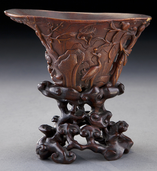 A Chinese late Ming or early Qing carved rhinoceros horn libation cup sold for $91,875, with an estimate of $8,000-$12,000. Image courtesy Dallas Auction Gallery.
