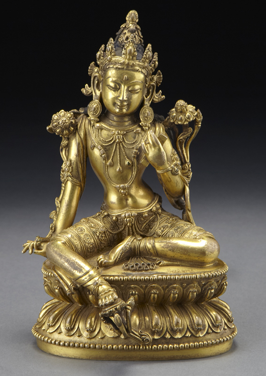 The Chinese Xuande imperial gilt bronze green Tara sold at mid-estimate for $61,250. Image courtesy Dallas Auction Gallery.