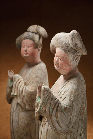 Pair of painted 'Fat Ladies' pottery figures from the Tang Dynasty (617-906 A.D.). Courtesy Courage and Joy.