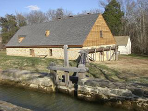 Reconstruction of George Washington's 1797 distillery near Mount Vernon, Virginia. This file is licensed under the Creative Commons Attribution-Share Alike 3.0 Unported license.