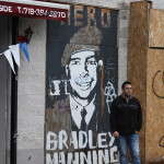 The Bradley Manning street art has received some graffiti of its own. Painting by Big Bamn. Photography by Kelsey Savage Hays.