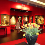 The TEFAF stand of London's Weiss gallery who sold the four important Tudor portraits on the back wall during the opening hour of the fair. The full-length portrait of Henry VIII on the right, known as The Ditchley Henry VIII, sold at an asking price of £2.5 million ($3.9m). Image Auction Central News.