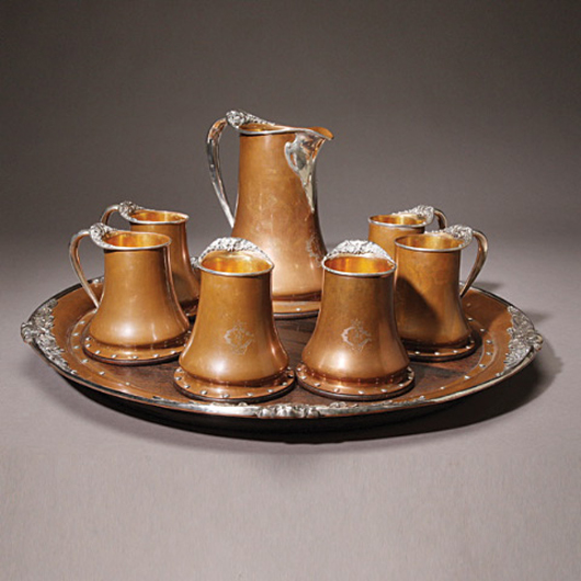Arts & Crafts mixed metal beer set by Thomas Brown, New York, retailed by Shreve & Co., San Francisco. Estimate: $18,000-$22,000. Image courtesy Michaan's Auctions.