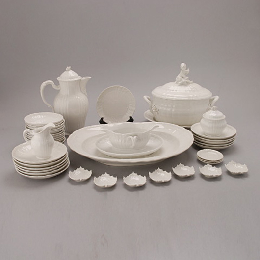 KPM Berlin Porcelain Rocaille dinnerware, 79 pieces. Estimate: $1,000-$1,500. Image courtesy Michaan's Auctions.  