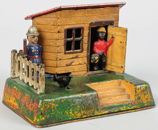 Uncle Remus cast-iron mechanical bank, est. $2,000-$3,000. Morphy Auctions image.