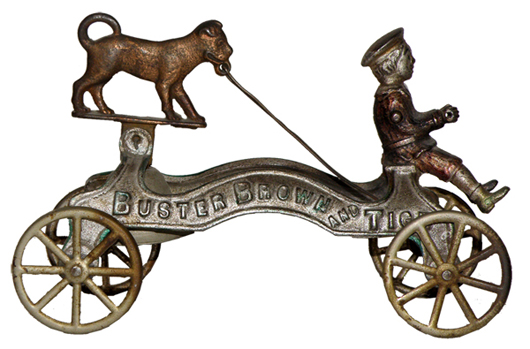Cast-iron Buster Brown and Tige pull toy by Watrous (American). Mosby & Co. image.