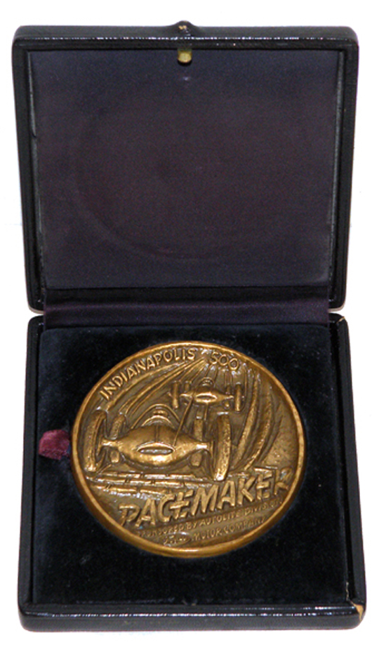 Indy 500 ‘Pacemaker’ medallion presented to racecar driver Paul Russo, 1956 or 1957. Mosby & Co. image.
