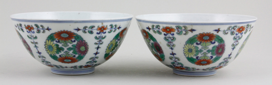 Pair of Famille Verte bowls, China, 19th-early 20th century, decorated with floral roundels, mark on base in double ring, 2 1/2 inches x 5 1/2 inches. Sold For $300,000. Image courtesy Kaminski Auctions.