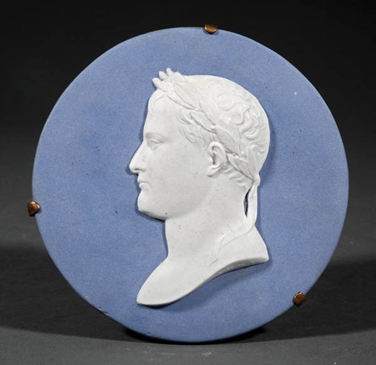 This Sevres portrait roundel of Napoleon wearing the wreath of a Roman emperor, slightly over 5 inches in diameter, brought $2,629 last February. Courtesy Neal Auction Company