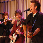 John Mellencamp (right) performing at Walter Reed Army Medical Center in 2007. Image courtesy Wikimedia Commons.