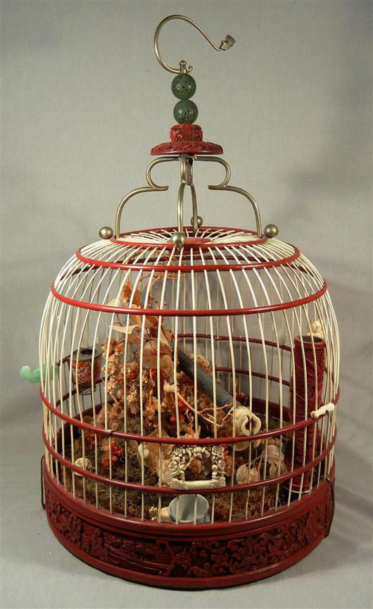 Carved ivory and inlaid lacquer birdcage, attributed to China's Ch'ien Lung period, 24 inches tall. Estimate: $7,000-$12,000. Image courtesy Matheson's AA Auctions.