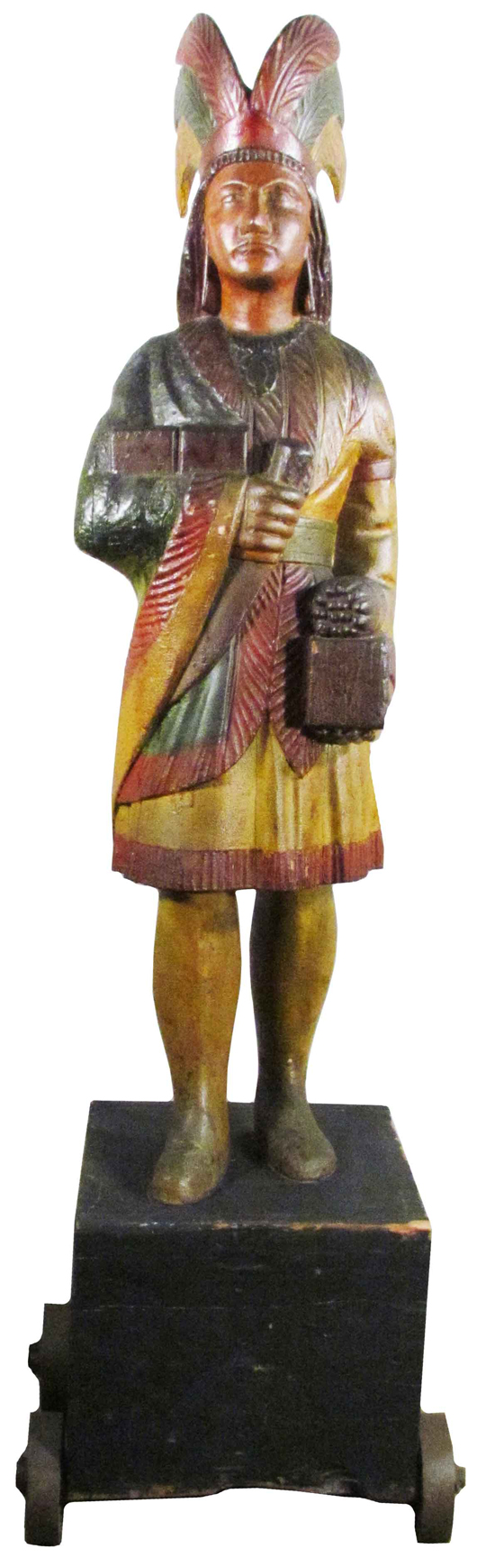 With its original paint intact, the 5-foot-tall Samuel Robb carved cigar store Indian achieved the auction's highest price, $94,400. Image courtesy Showtime Services.   