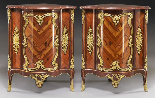 Pair of Pierre IV Migeon tulipwood corner cabinets, each having a conforming rouge griotte marble top. Estimate: $175,000-$225,000. Image courtesy Dallas Auction Gallery.  
