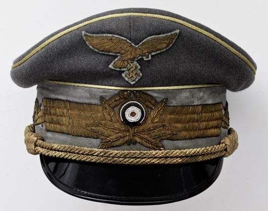 Rare German World War II field marshal's visor similar to the cap worn by Herman Goering. Estimate $20,000-$40,000. Image courtesy Cowan’s Auctions Inc.   