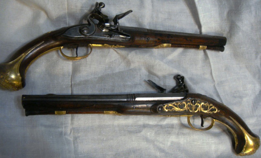 This beautiful pair of Ponsin circa-1700 continental European flintlock dueling pistols hit the mark for $6,325. Image courtesy Tim's, Inc.   