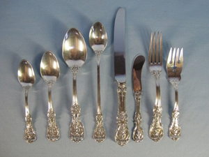 Sterling silver place setting from 61-piece Reed & Barton service. Maria Mozgova Auction image.