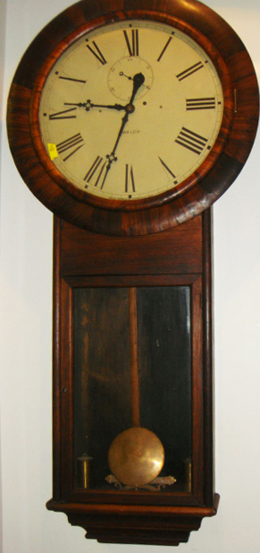 Large rosewood E.N. Welch (Forestville, Conn.) wall regulator weight driven clock, circa 1880s, $2,242. Image courtesy Tim's, Inc.