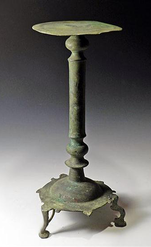 Roman Bronze Lamp Stand, Possibly from Herculaneum, ca. 1st century BC.  Estimate $5,000 - $7,000. Image courtesy of Antiquities-Saleroom.com.