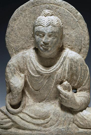 Gandharan Schist Seated Buddha, Ca. 2nd to 4th Century AD. Estimate $3,000 - $5,000. Image courtesy of Antiquities-Saleroom.com.