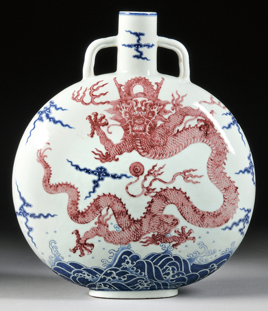 18th-century copper red and underglaze blue flask, 16 1/8 in., Qianlong mark to base, $270,000. Image courtesy Skinner Inc.