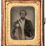 Civil War tinted tintype of man draped in the flag of the 18th Tennessee Infantry. Sold for $400 + buyer's premium in Affiliated Auctions' Dec. 5, 2009 sale. Image courtesy of LiveAuctioneers.com Archive and Affiliated Auctions.