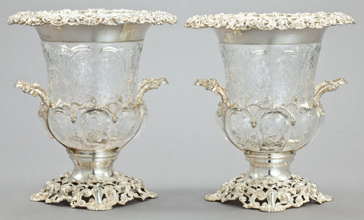 Wine coolers were often made in pairs and came in various sizes to use with different vintages. These wheel-cut crystal containers on a reticulated base by London maker William Comyns & Sons, 1903-1904, brought $8125 last month.  Courtesy Heritage Auctions   