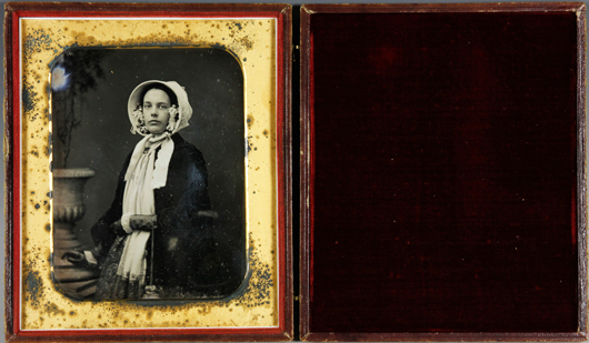 Exceptional daguerreotype of a standing woman by Southworth & Hawes, half plate, full case, 7 inches x 5 3/4 inches. Split on spine. Identified in the catalog for Guernsey's sale in 2007, The Naylor Collection, as Elizabeth Breton Johnson Wills, Margaret's grandmother. Kaminski's image.