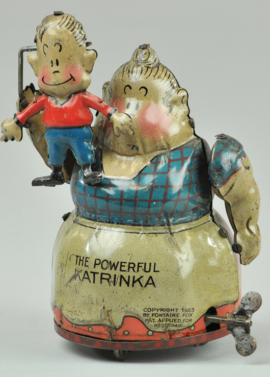 Nifty Powerful Katrinka, German, tinplate windup, $2,588. Bertoia Auctions image.