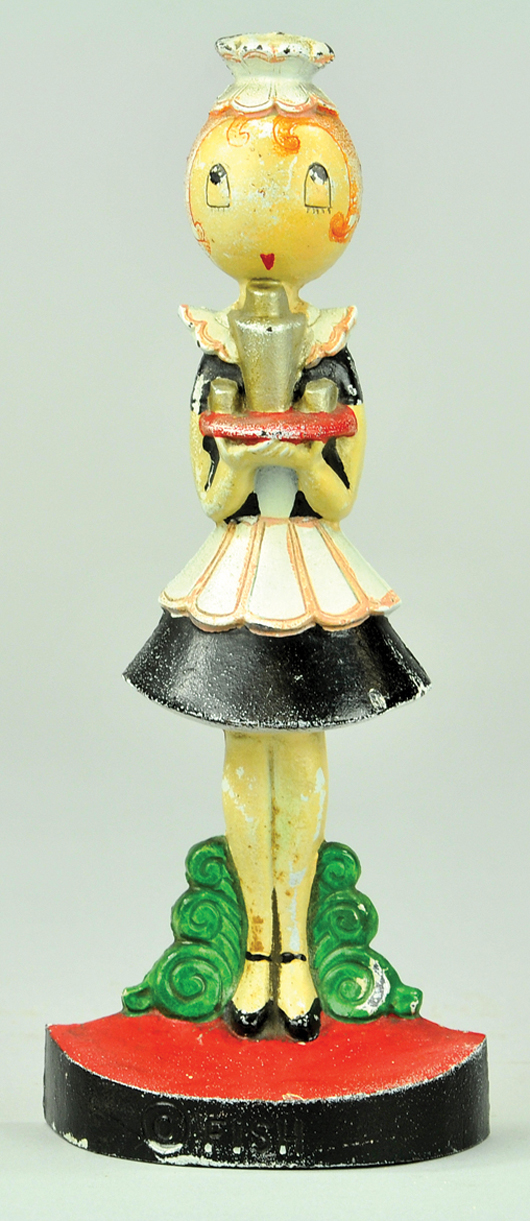 Hubley Parlour Maid figural cast-iron doorstop, designed by Anne Fish, $5,463. Bertoia Auctions image.