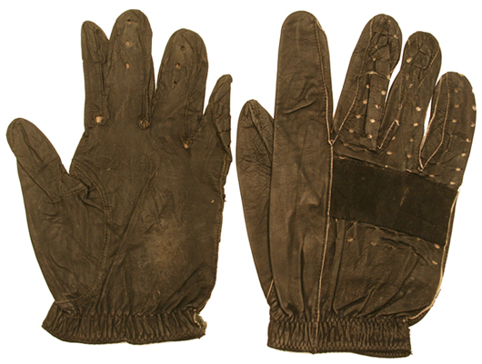 Jim Clark's personal F1 racing gloves worn in practice for his last F1 race. PFC Auctions image.