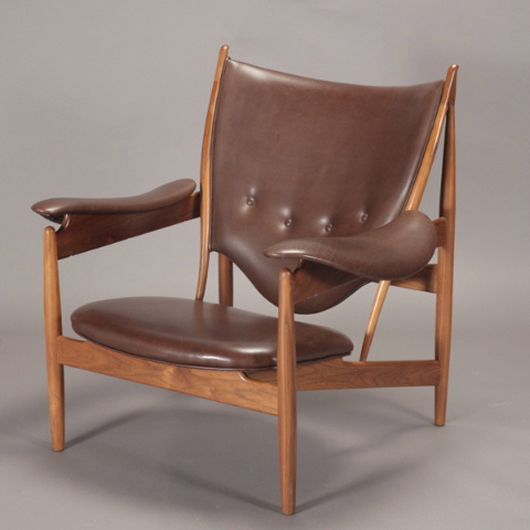 Finn Juhl Chieftains chair, designed in 1948, of later production, possibly MFG Baker. Estimate: $3,000-$6,000. Image courtesy Michaan's Auctions.