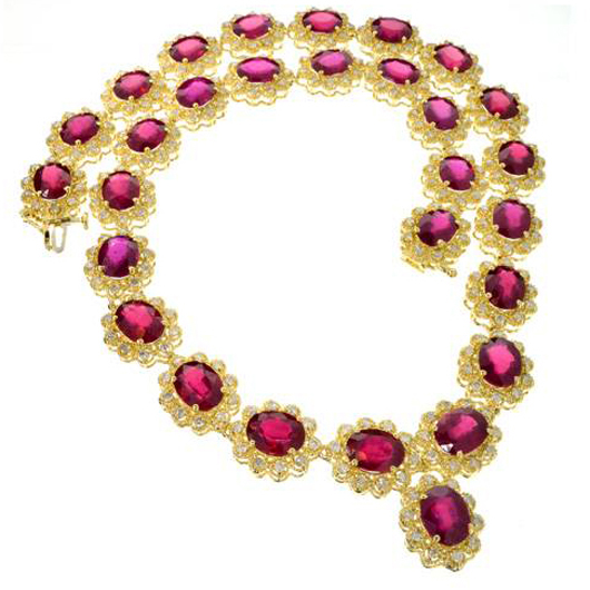 74 carat ruby and 5 carat diamond necklace. Government Auction image.