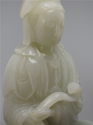 Chinese white jade figure of Bodhisattva Guanyin, early 20th century, 8.9 inches high. Estimate: $25,000-$30,000. Image courtesy Joyce Gallery Auction.