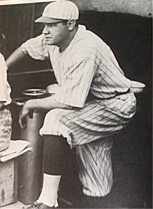 Babe Ruth in the dugout during his first season with the New York Yankees in 1920. Image courtesy Wikimedia Commons.