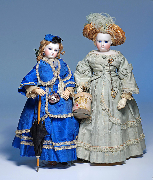 All original 16-inch French bisque poupee with original Maison Alph-Giroux and a 17-inch French bisque poupee by Leontine Rohmer. Image courtesy Frasher’s Doll Auctions. 