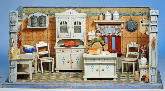 German wooden dollhouse kitchen with furnishings. Image courtesy Frasher’s Doll Auctions.   