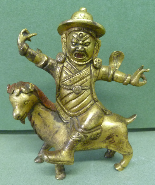 Tibetan golden bronze of Yamantake on his steed, 18th/19th century. Asian Antiques & Art Gallery image.   