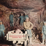An early 1900s postcard pictures miners in an iron mine in Ironwood, Mich. Image courtesy Wikimedia Commons.